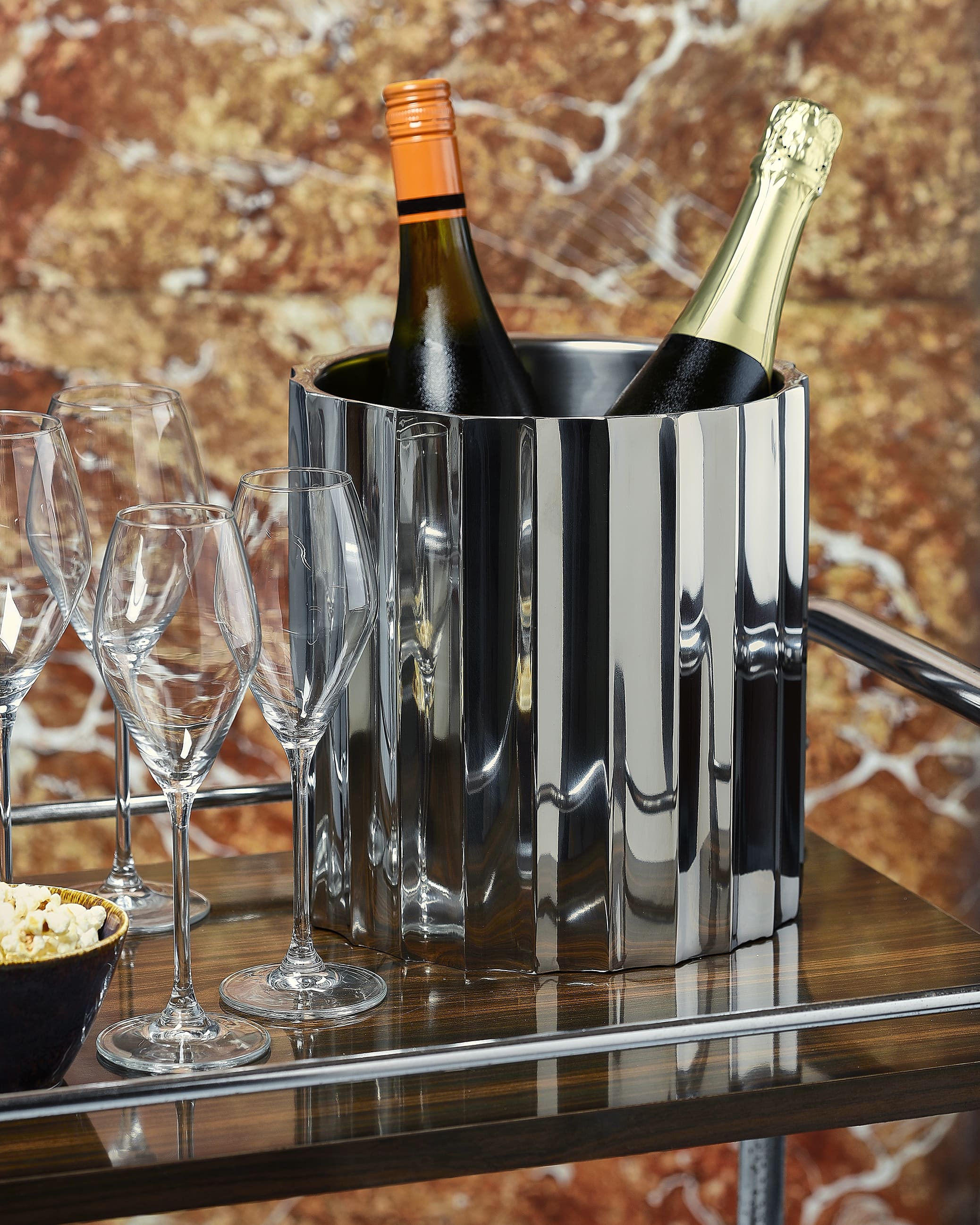 Wave collection of double-walled champagne and wine coolers, perfect for keeping drinks cool with a contemporary look.